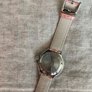 Tag watch with diamonds